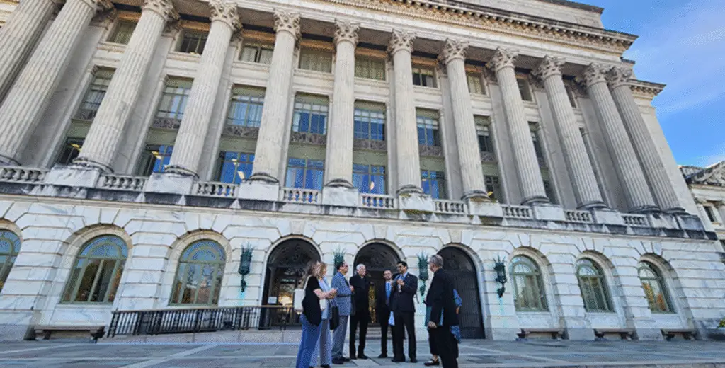 A group of advocates in front of the Capitol building in Washington, DC.
